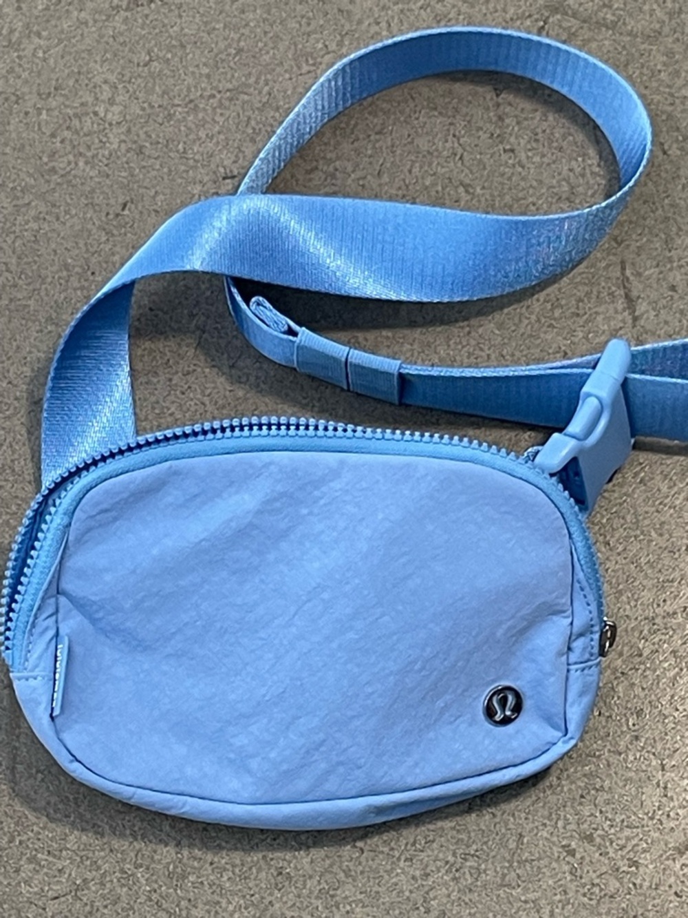 lululemon light blue pouch with logo tab